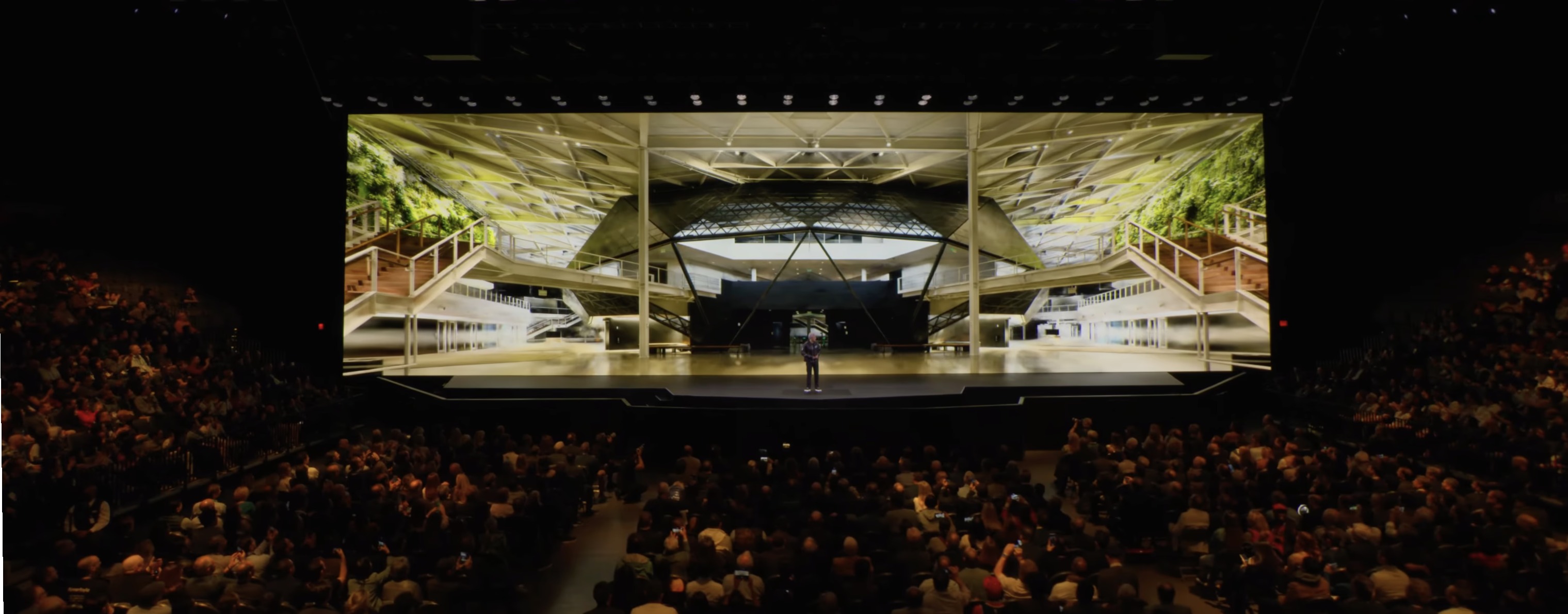 Jensen Huang on stage with the NVIDIA campus radiance field environment at CES 2025